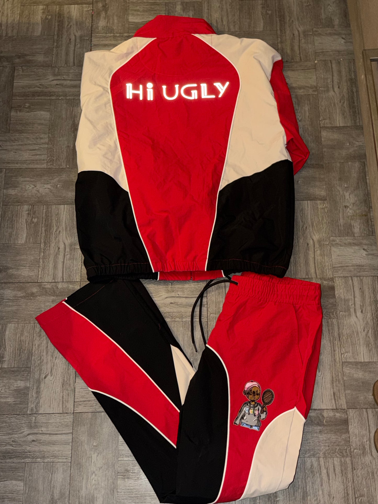 Red Black and tan tracksuit ￼